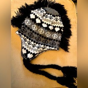 Knit winter cap with fringe